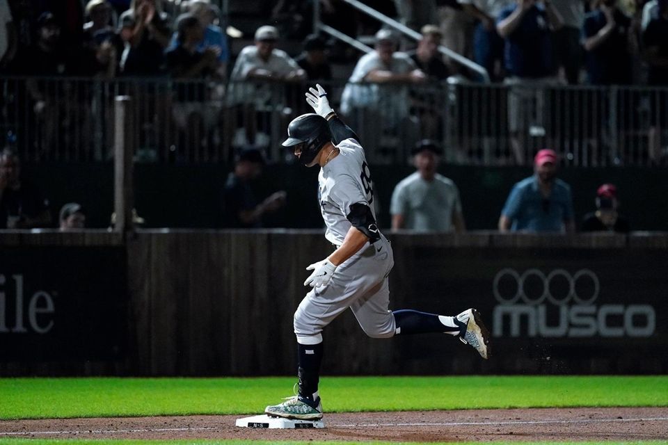 New York Yankees' Aaron Judge rounds third base