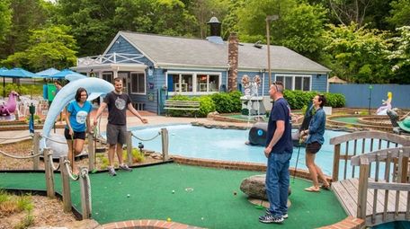 Visitors play the course at the Whale's Tale