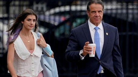 New York Gov. Andrew Cuomo prepares to board