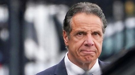 Gov. Andrew M. Cuomo prepares to board a
