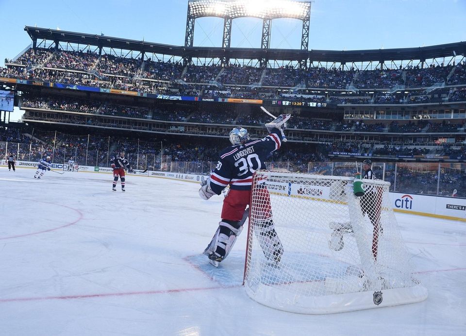 New York Rangers goaltender Henrik Lundqvist deflects the