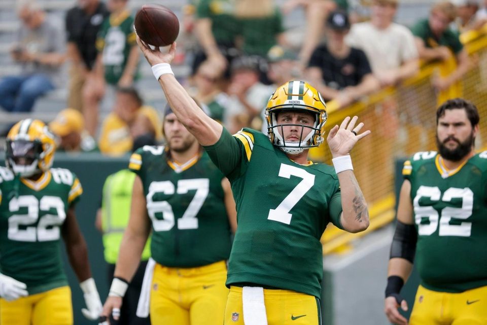 Green Bay Packers' Kurt Benkert warms up before