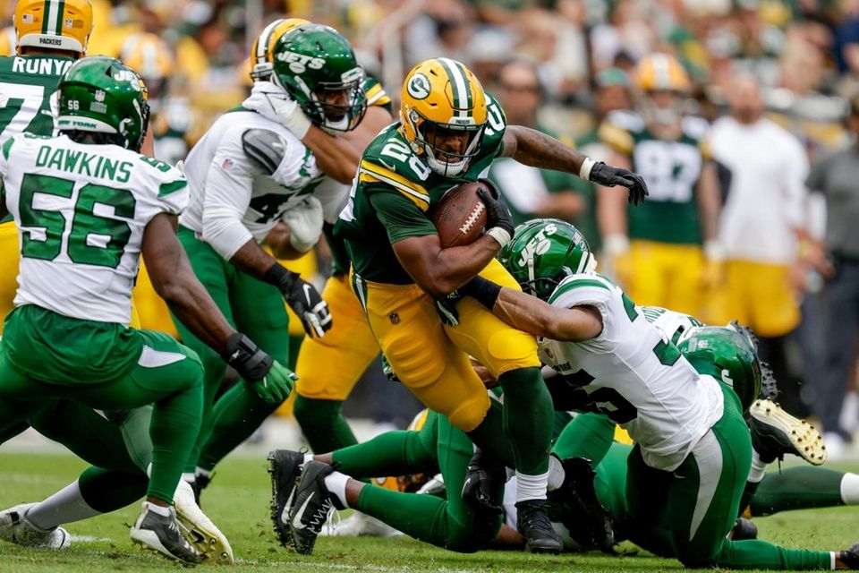 Green Bay Packers' AJ Dillon runs during the