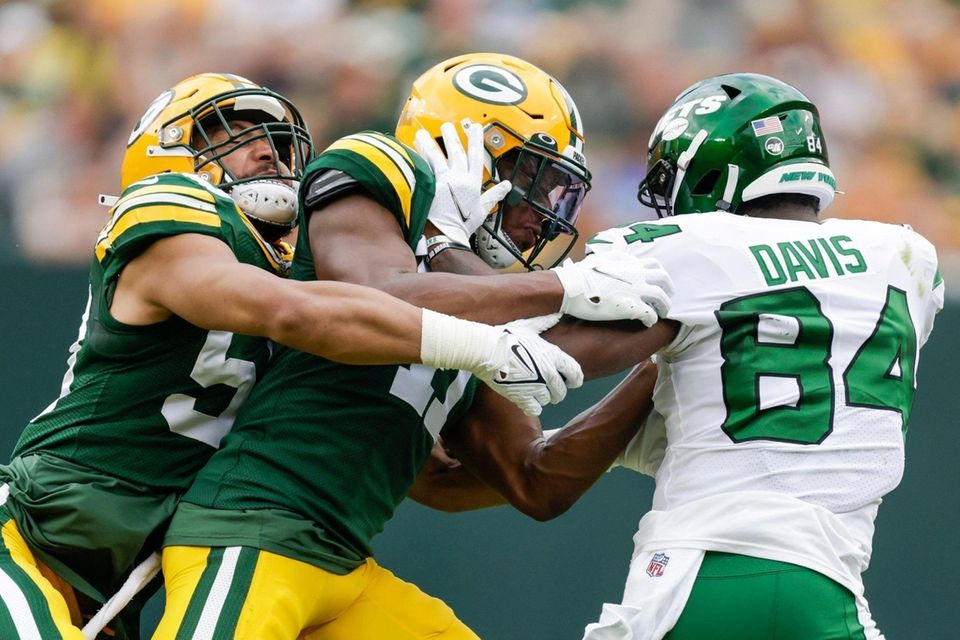 Green Bay Packers' Tipa Galeai and Henry Black