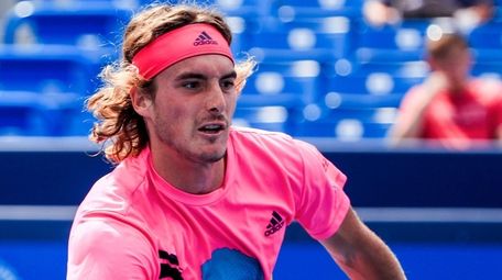 Stefanos Tsitsipas in action against David Goffin in