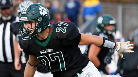 Tim Weber #10 of West Islip runs the