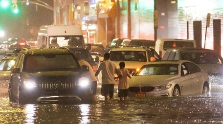 Cars stuck on a flooded street when Hurricane