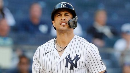 Giancarlo Stanton of the Yankees strikes out in