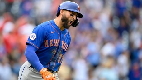 Mets' Kevin Pillar reacts after he hit a