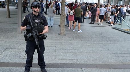 A New York Police officer stands watch at