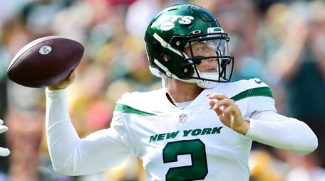 Zach Wilson of the Jets throws a pass