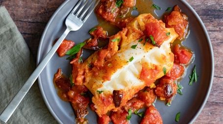 Cod is braised in a flavorful mix of