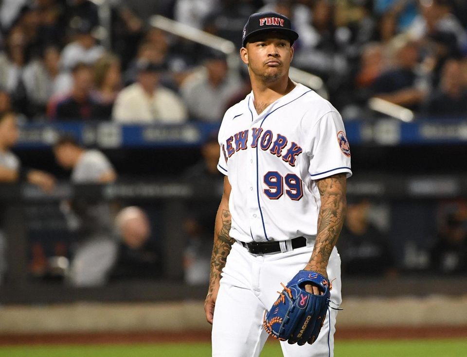 New York Mets starting pitcher Taijuan Walker walks