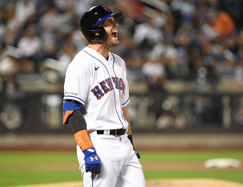 New York Mets left fielder Jeff McNeil reacts
