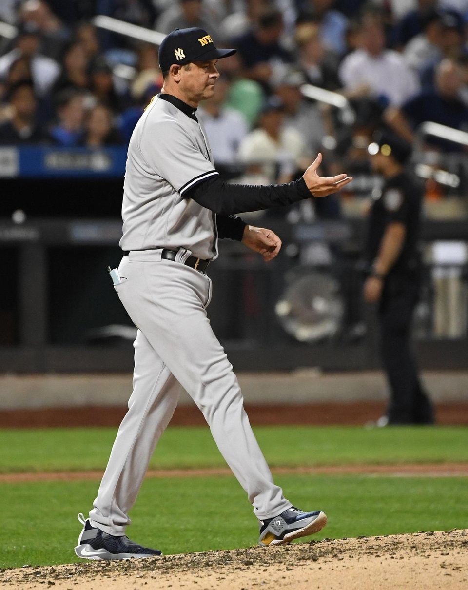 New York Yankees manager Aaron Boone approaches the