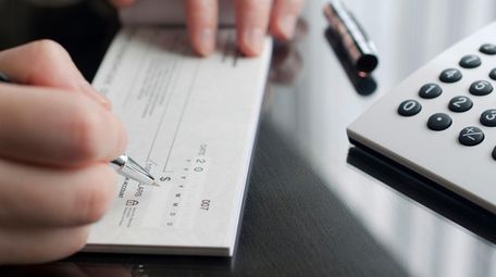 Financial planners say keeping two separate checkbooks and