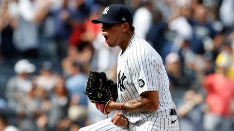 Jonathan Loaisiga of the Yankees reacts after the