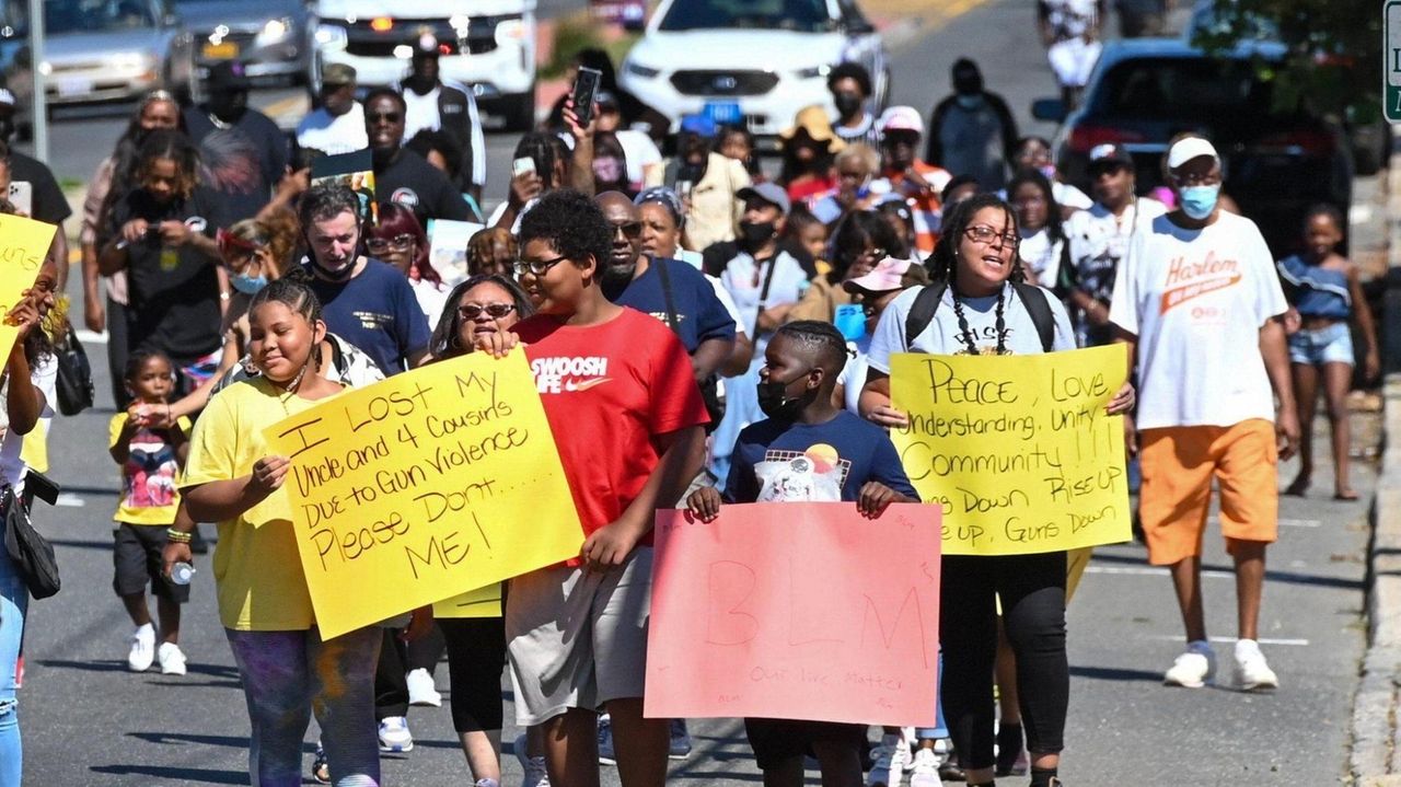 Residents of Wyandanch gathered to march against gun