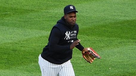 New York Yankees pitcher Luis Severino walks to