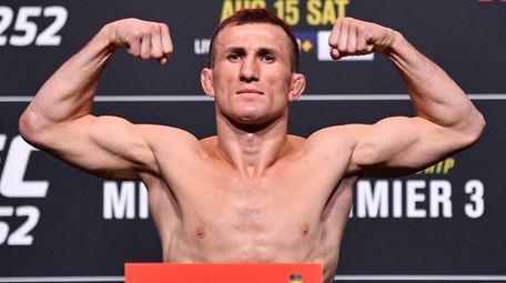 Merab Dvalishvili of Georgia poses on the scale