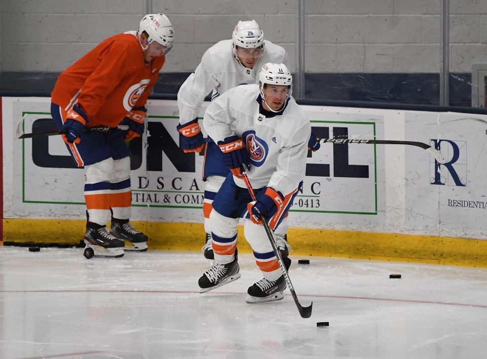 Zach Parise and his New York Islanders teammates skate