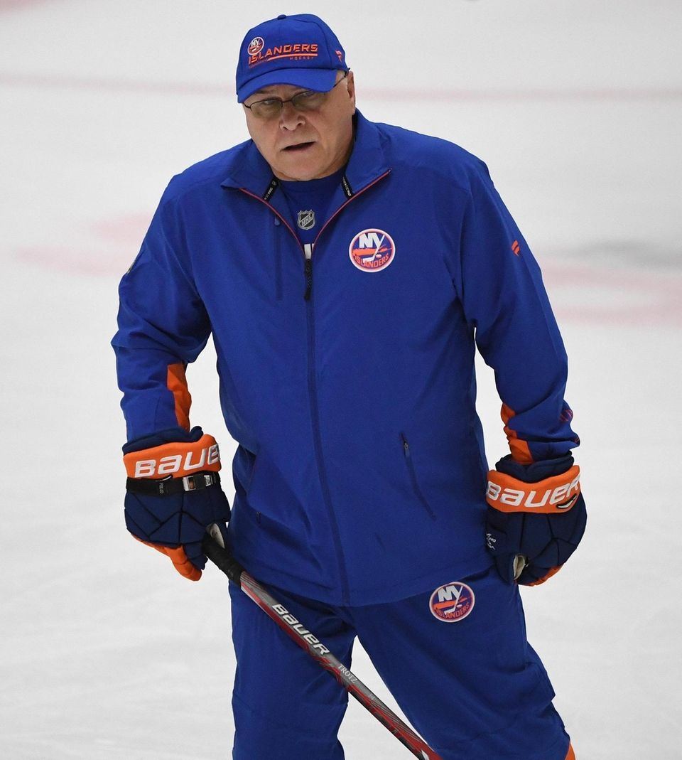 New York Islanders head coach Barry Trotz watches