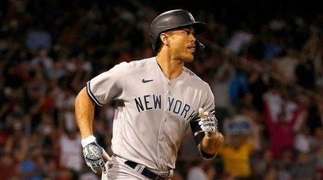 Giancarlo Stanton of the Yankees runs the bases