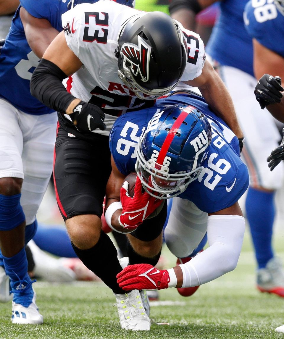 Erik Harris #23 of the Atlanta Falcons takes
