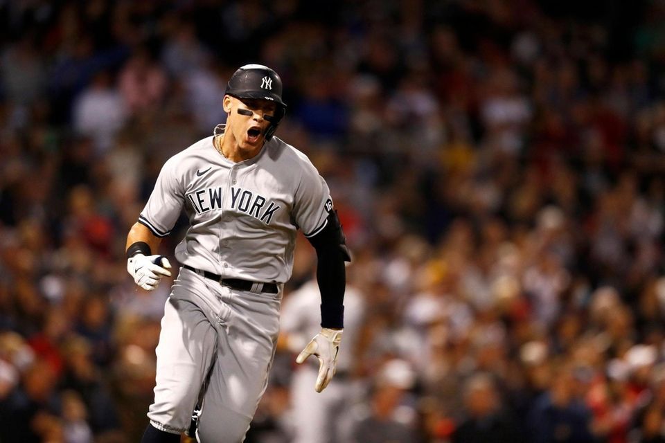 Aaron Judge of the Yankees reacts after hitting