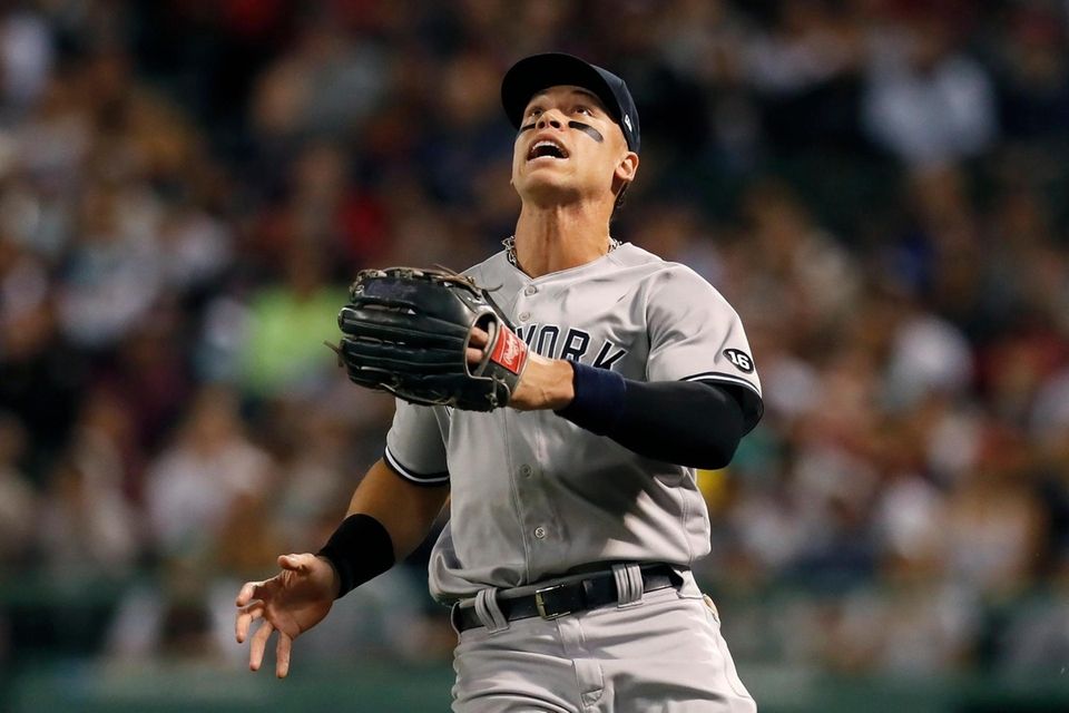 New York Yankees' Aaron Judge looks to field