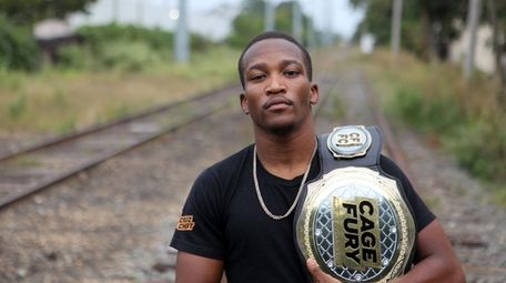 Phumi Nkuta, who lives in Massapequa, poses with
