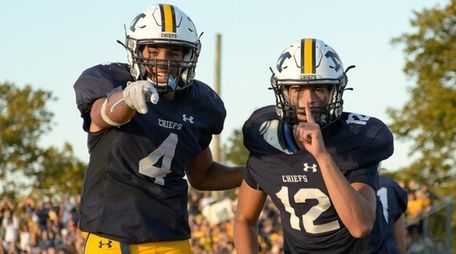 Ryan Heidrich and Michael D'Alessandro celebrate a touchdown