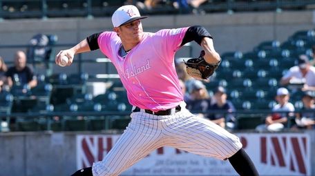 Ducks starting pitcher Matt Dallas delivers a pitch