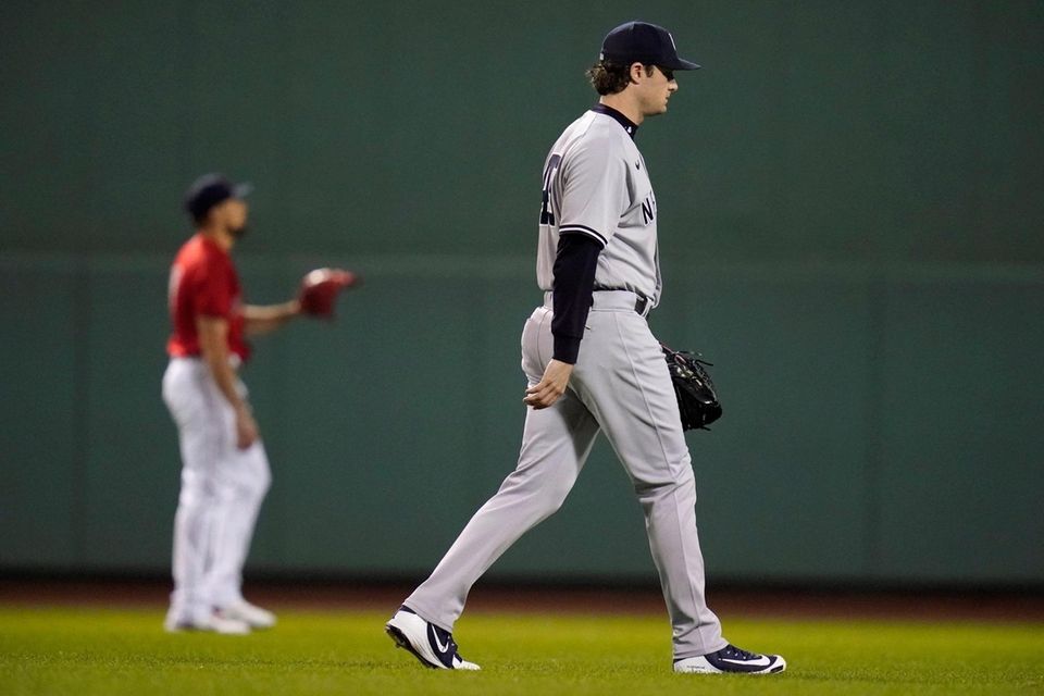 New York Yankees starting pitcher Gerrit Cole, right,