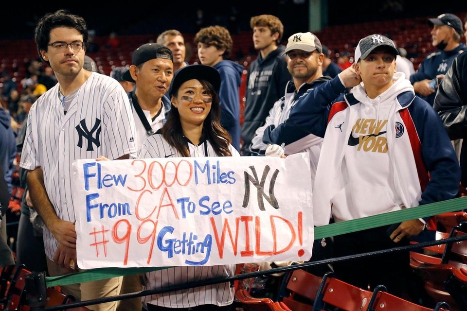 BOSTON, MASSACHUSETTS - OCTOBER 05: Fans look on