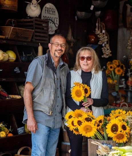 Larry Kaiser and Margret Feinberg in the produce