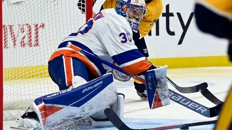Islanders goaltender Ilya Sorokin (30) blocks a shot