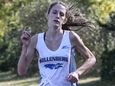 Kellenberg's Kathleen Healy crosses the finish line in