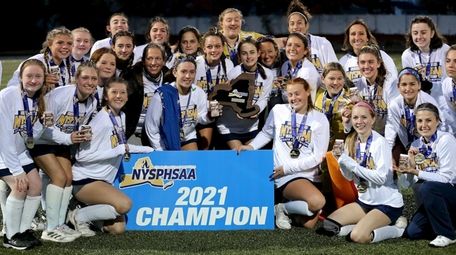 Northport girls field hockey team pose with the