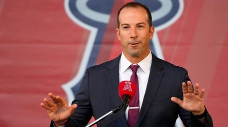 Angels general manager Billy Eppler answers questions during