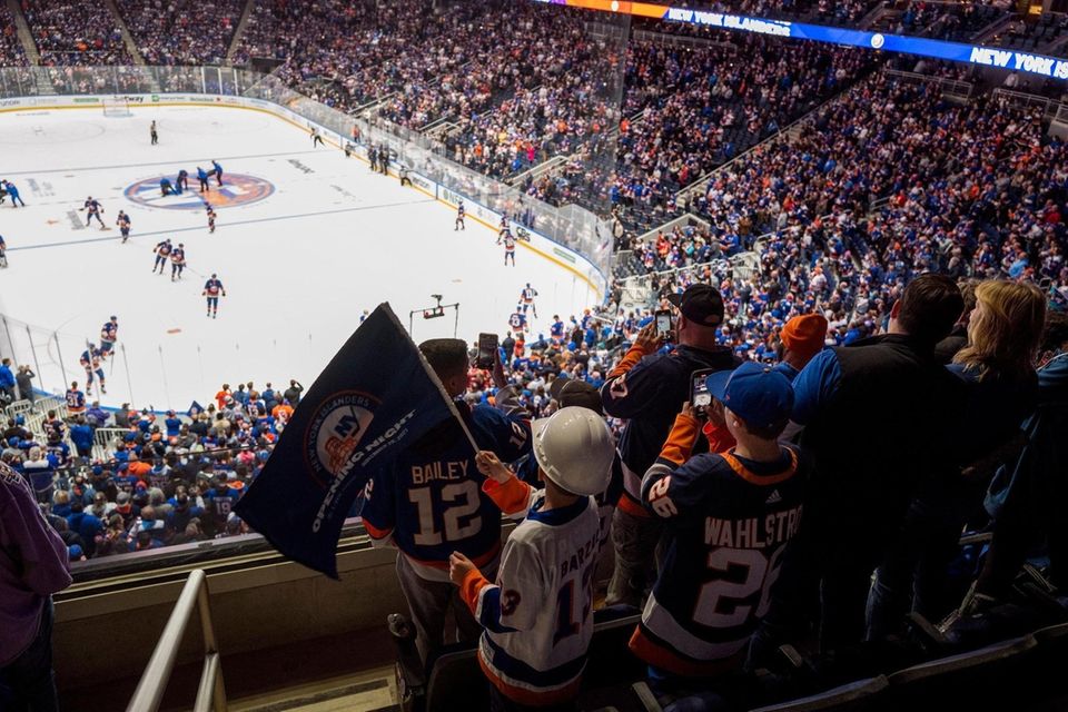 Islanders fans watch just before the first puck