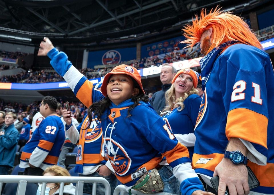 New York Islanders fans watch during warmups at