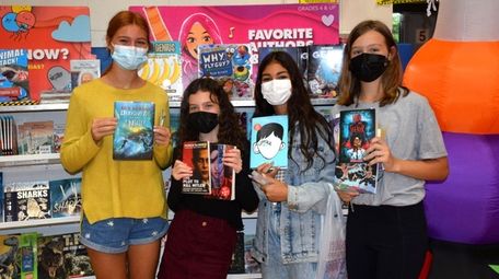 Floral Park-Bellerose School students eagerly looked through books
