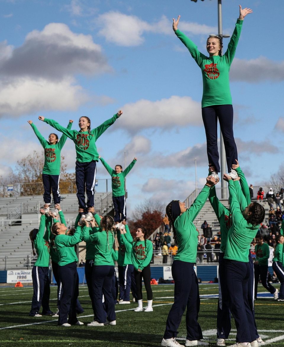 The Massapequa cheerleaders entertain during halftime of the