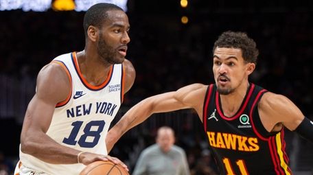 Atlanta Hawks guard Trae Young (11) defends Knicks