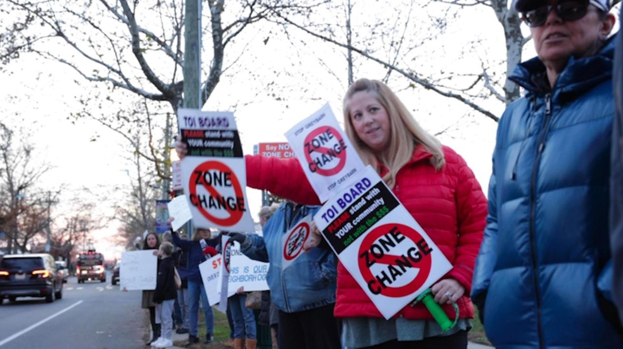 Sayville residents protested a proposed Greybarn apartment complex