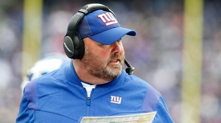 Freddie Kitchens of the Giants looks on against