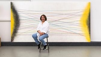 Says Virginia Jaramillo, in front of her painting