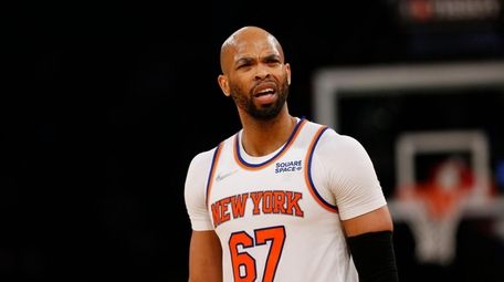 Knicks center Taj Gibson (67) reacts after being
