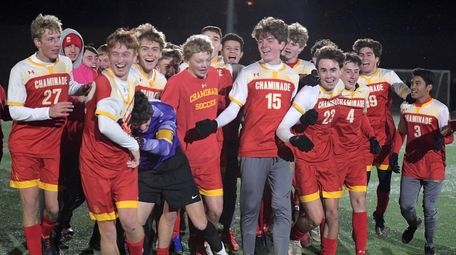 The Chaminade boys soccer team celebrates after defeating